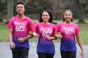 Cancer survivor Crystal Manuel (centre) pictured taking part in the Race for Life with her children Cameron (left), 15, and Chaia (right), 13