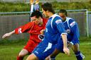 Redditch's Chris Murphy (left) in the thick of the action on Saturday.