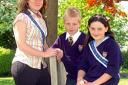 Astwood Bank Carnival queen Elizah Barnes, 17, with carnival prince Edward Goddard and princess Laura Potter, both 10. 