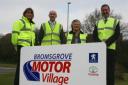 PROMOTING BROMSGROVE: Julie Heyes, Tim Mayneord, Janice Boswell and Stephen Field, of Toyota Westlands, inspect an adopted  island.