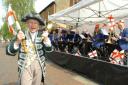LET'S HEAR IT FOR ST GEORGE: Town Crier Kevin Ward was in fine voice as he urged townsfolk to take part in the fun.