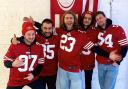 Conor Rabone (centre) with Gathering of Strangers donning the 49ers jersey