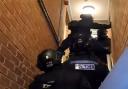 Police carrying out a drugs warrant in Redditch