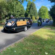 Nick Bennell arrived in a specially designed hearse sidecar