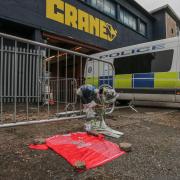 Tributes left outside the Crane nightclub in Birmingham