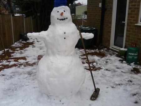 Tierney Drinkwater and Jordan Guilfoyle, from Studley, say their snowman was bigger than them!
