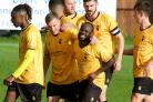 Javia Roberts celebrates with his team-mates after scoring against St Ives. Photo: Paul France