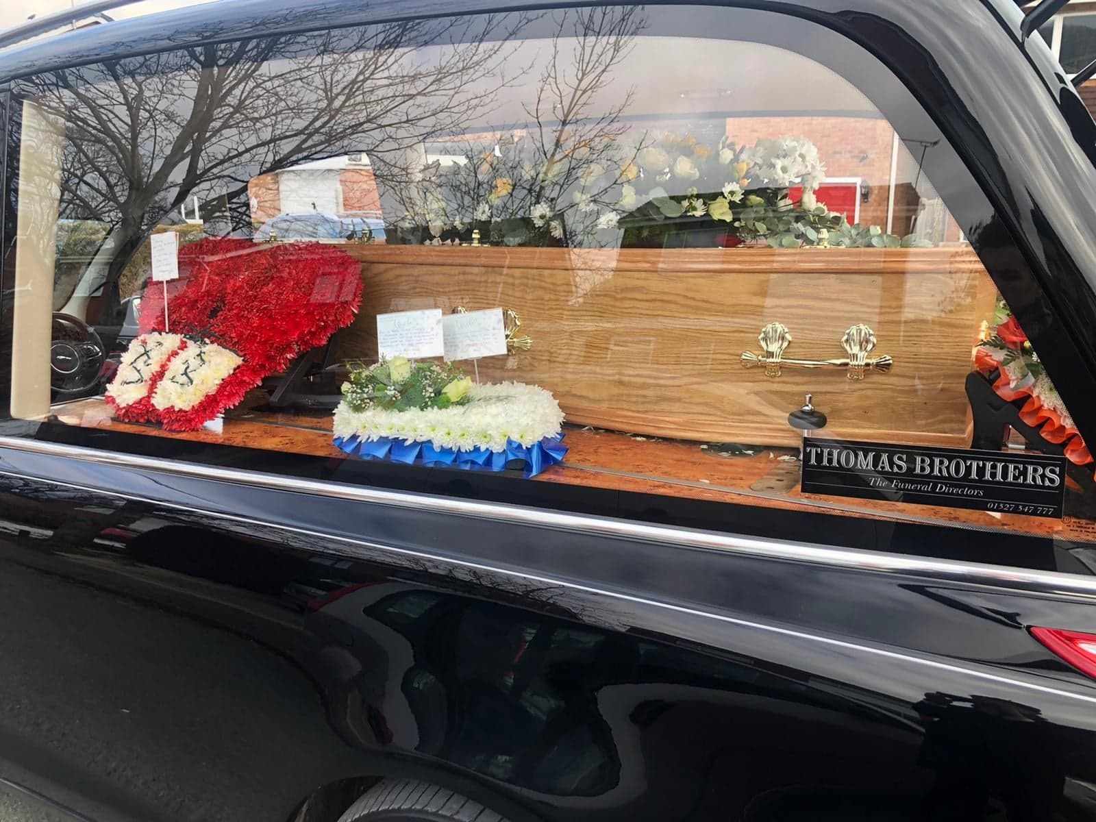 Jimmy Morans coffin brightly decorated for the funeral service 