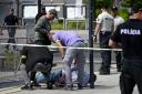 Police arrest a man after Slovak Prime Minister Robert Fico was shot(Radovan Stoklasa/TASR via AP)