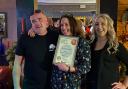 The team at the Royal Oak in Alcester receiving the 'Pub of the Season' award.