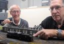 Redditch Model Railway Club members Buch McInroy (left) and John Tisi (right) preparing a layout for the 51st Model Railway Exhibition in March