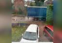 A picture of what Jordan claims is a delivery blocking access to his property