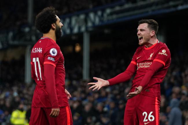 Mohamed Salah and Andy Robertson celebrate