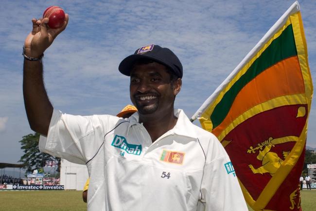 Muttiah Muralitharan leaves the field after becoming Test cricket’s leading wicket-taker