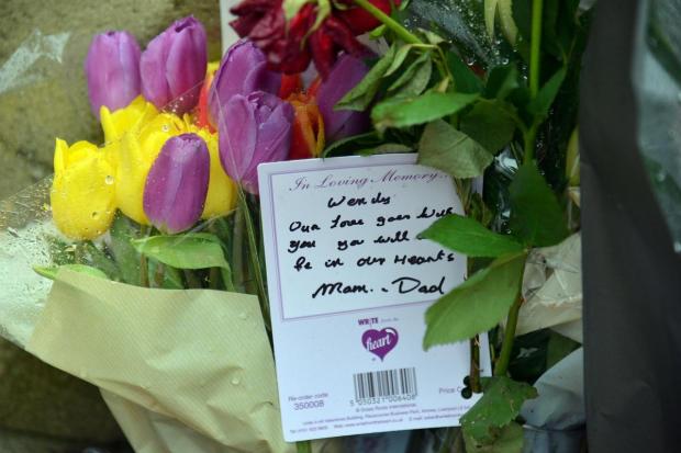 Photo shows a floral tribute left to Wendy Fawell by her mum and late dad in 2017.
