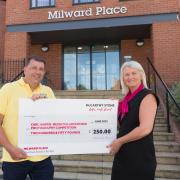 Carl Harris, photography winner, and Alison Dee, Sales Consultant at McCarthy Stone. Picture McCann PR