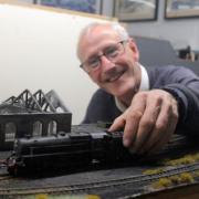 Club member Buch McInroy prepares a layout for the show