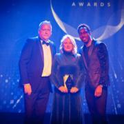 Ann Isherwood (Centre) with the managing director of Canva Security, Richard Payton (left) and songwriter and record producer Lemar Signer (right)