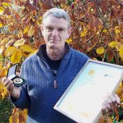 Gary Farmer with his Worcestershire Wildlife Medal