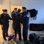 A man being arrested following a warrant