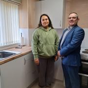 Cllr Warhurst with tenant Ms Giles in the new kitchen