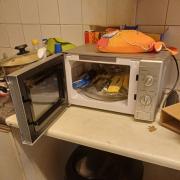 Illegal items hidden inside a microwave at the shop
