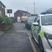 The scene on Barncroft Road as West Midlands Police launched a murder investigation