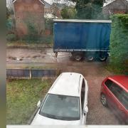A picture of what Jordan claims is a delivery blocking access to his property